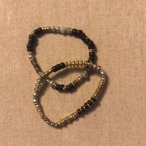 Two mixed material stretch bracelets